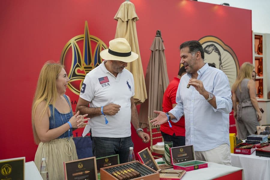 Guests tasting beside the cigar display