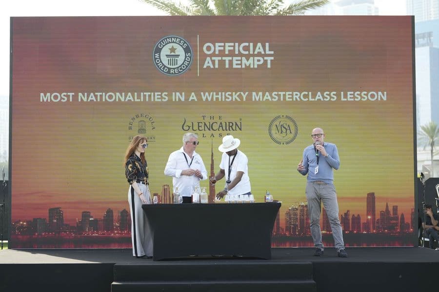 The Guinness World Records official attempt signage on stage