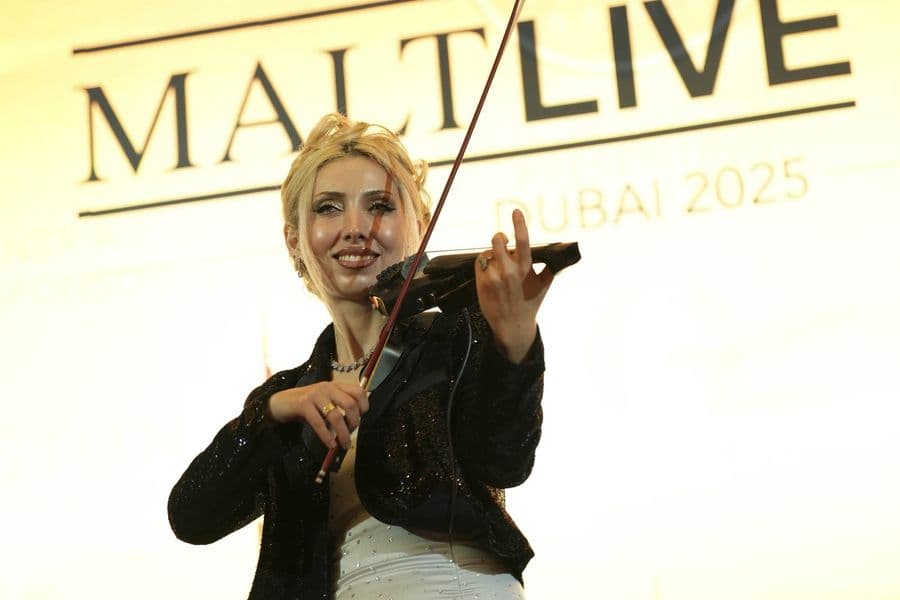 A host presenting at the MaltLive welcome stage