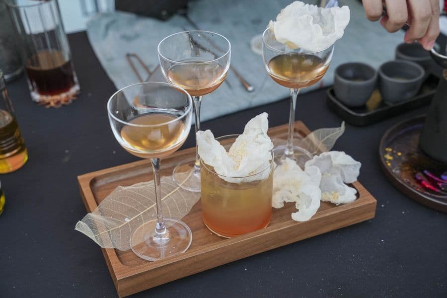 A tasting flight presented on a serving board