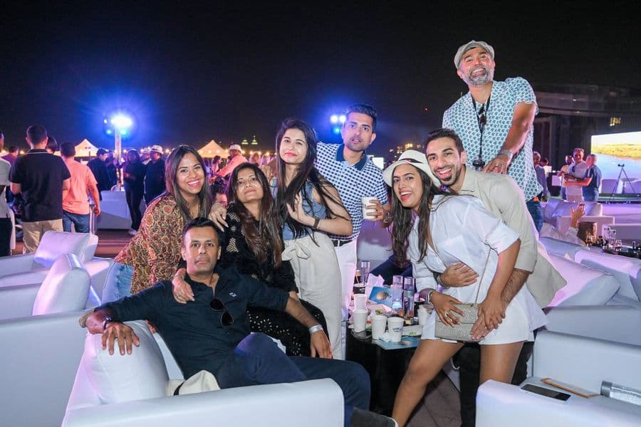 A group photographed on the lounge sofas during the evening