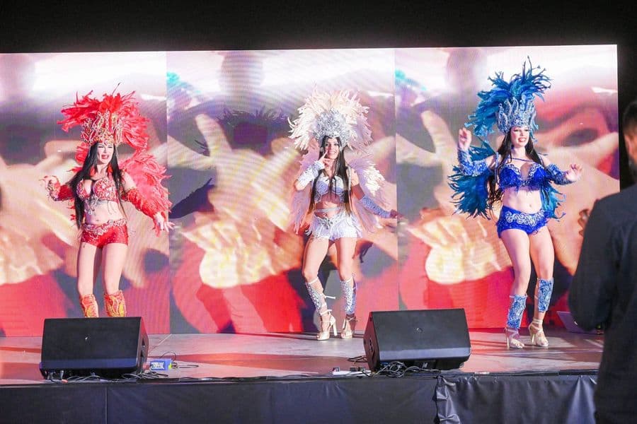 Carnival dancers in full costume on stage