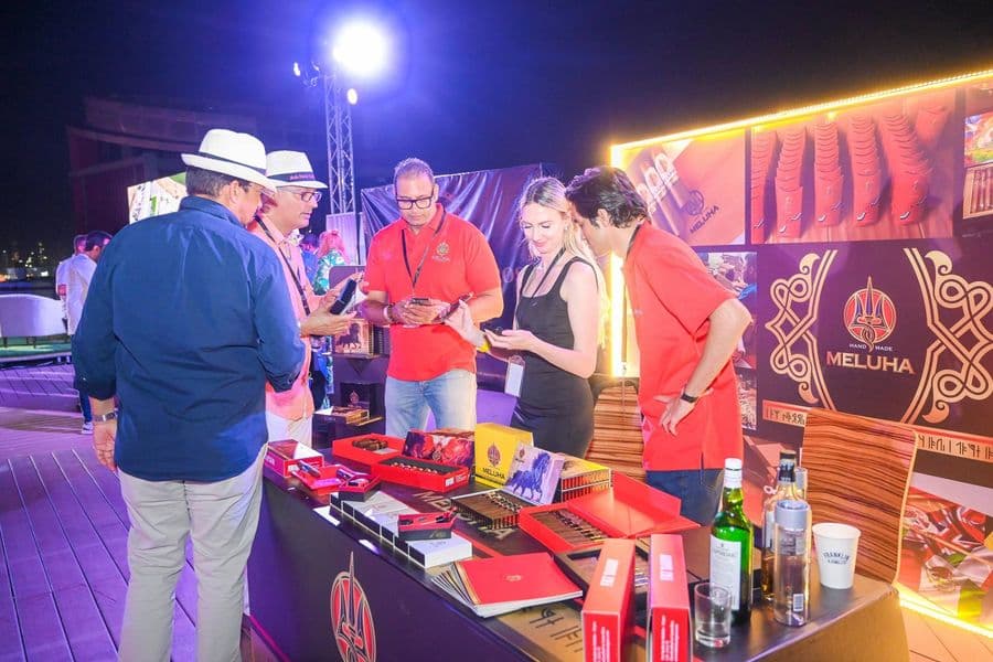 Guests choosing cigars at the humidor table