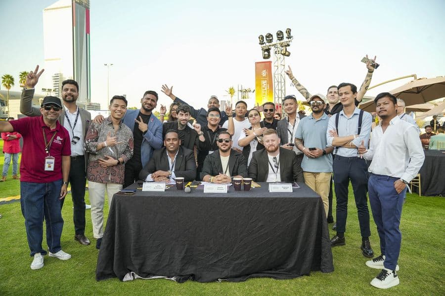 The crowd raising glasses together at the world record attempt